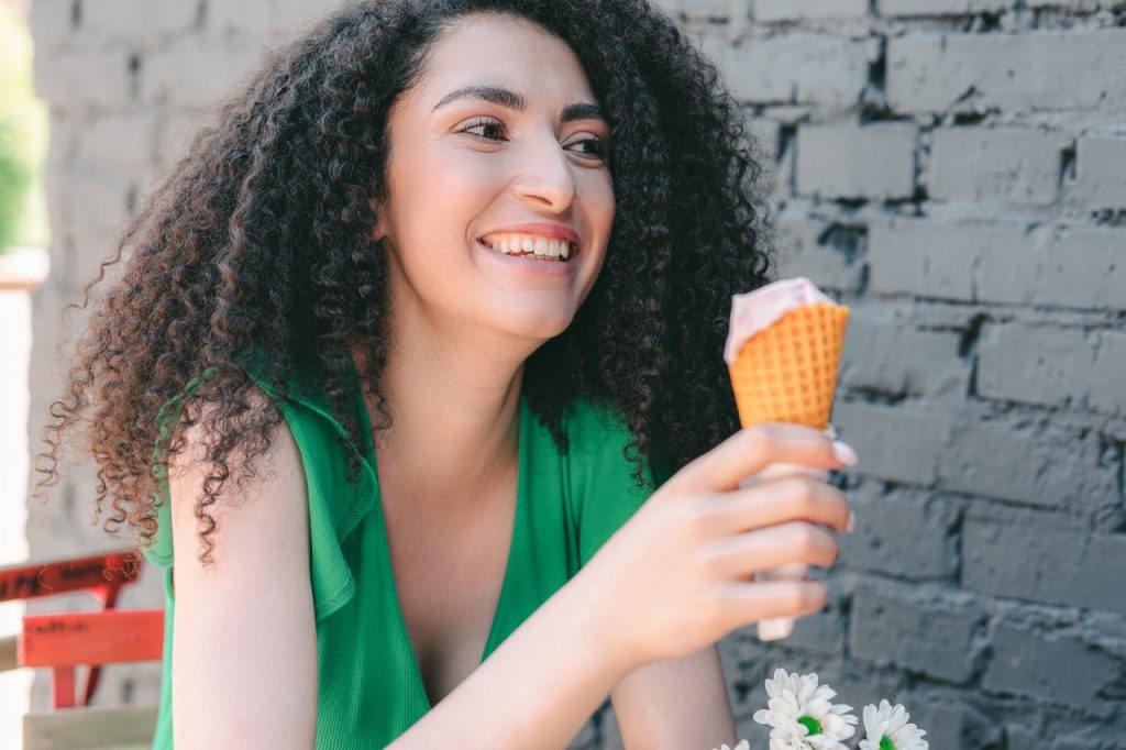 woman eating icecream.